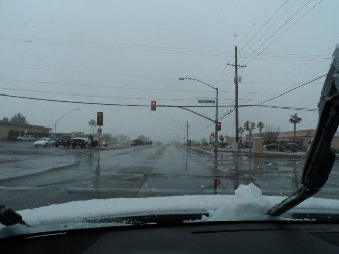 Driving with snow on the hood